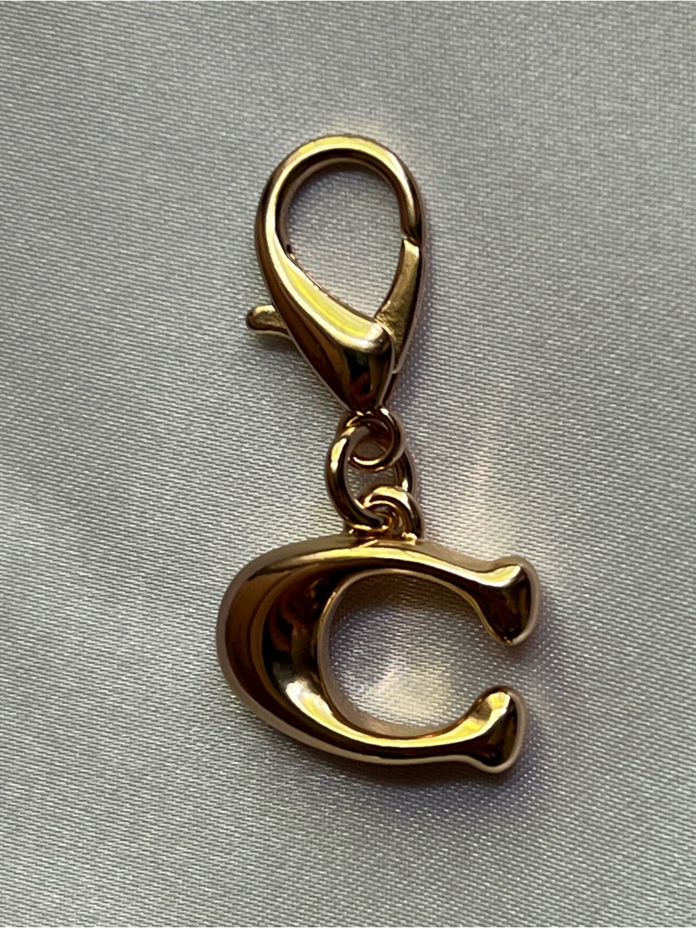 COACH Gold C Clip-On Charm